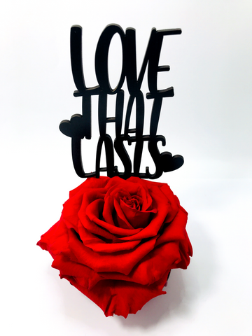 LOVE THAT LASTS stand with RED FOREVER ROSE